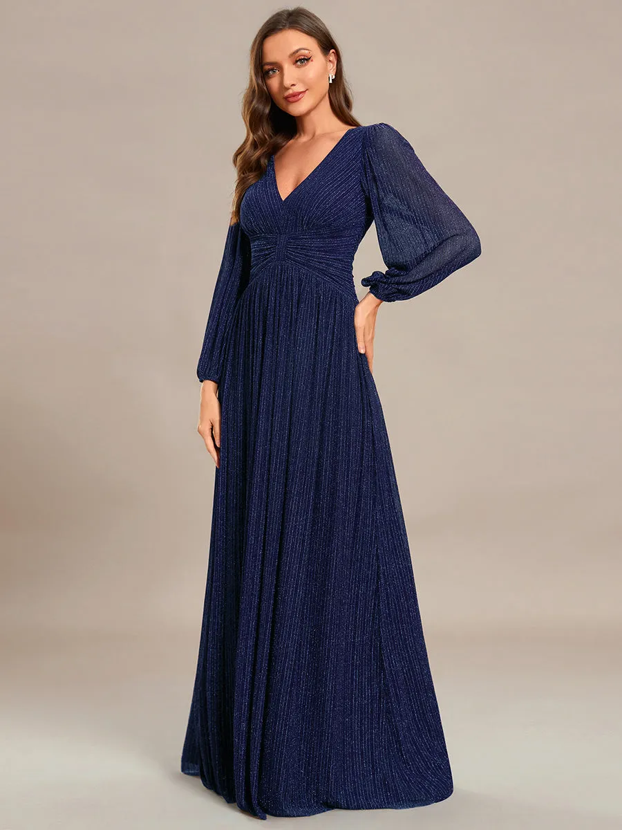 Robe de soirée trapèze à manches longues et taille empire scintillante