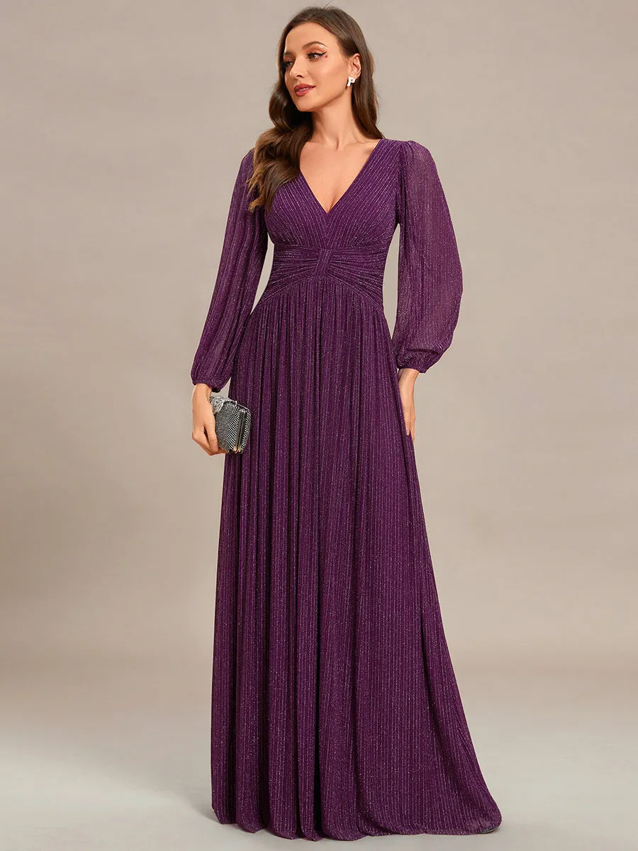 Robe de soirée trapèze à manches longues et taille empire scintillante