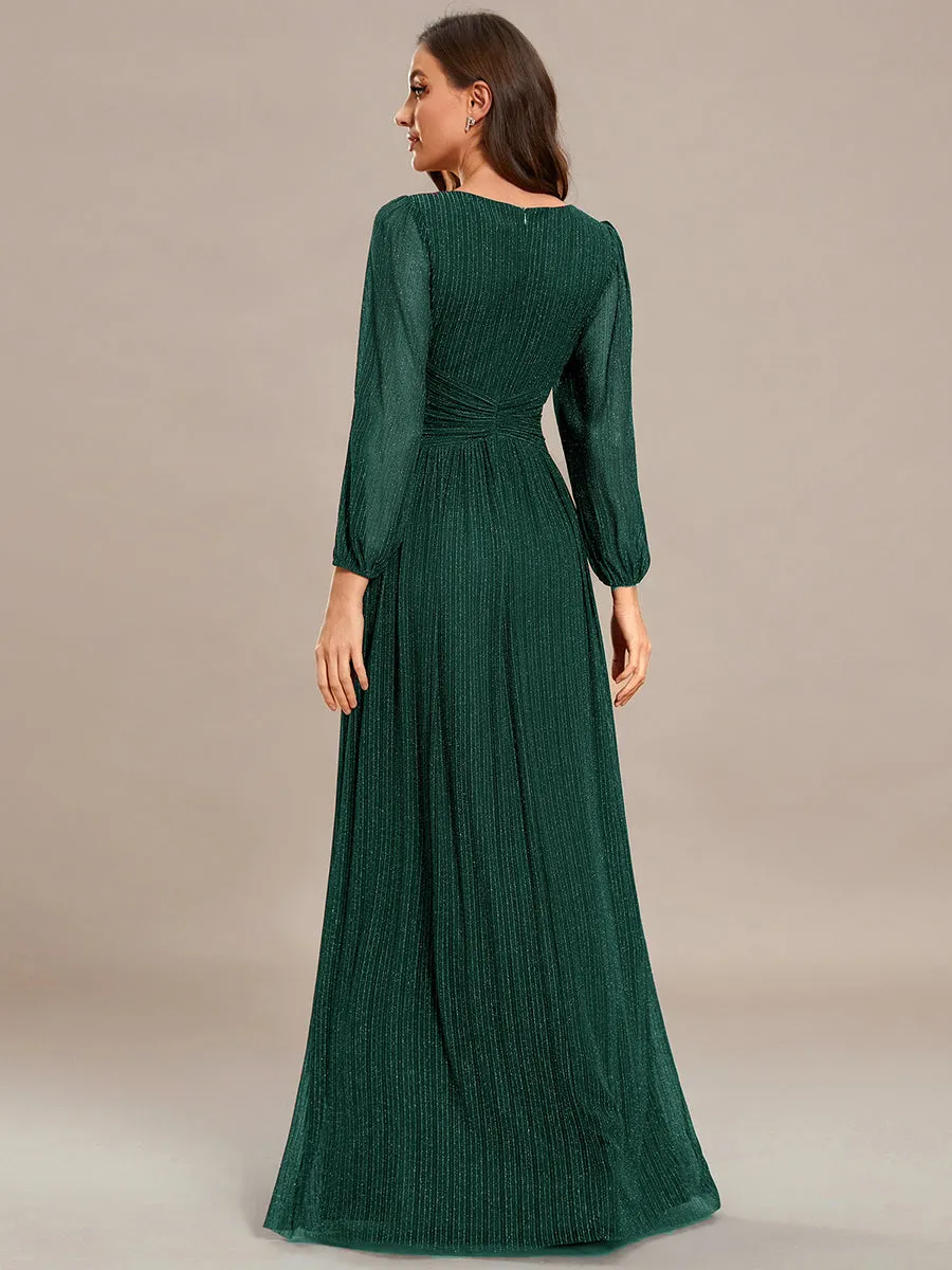 Robe de soirée trapèze à manches longues et taille empire scintillante