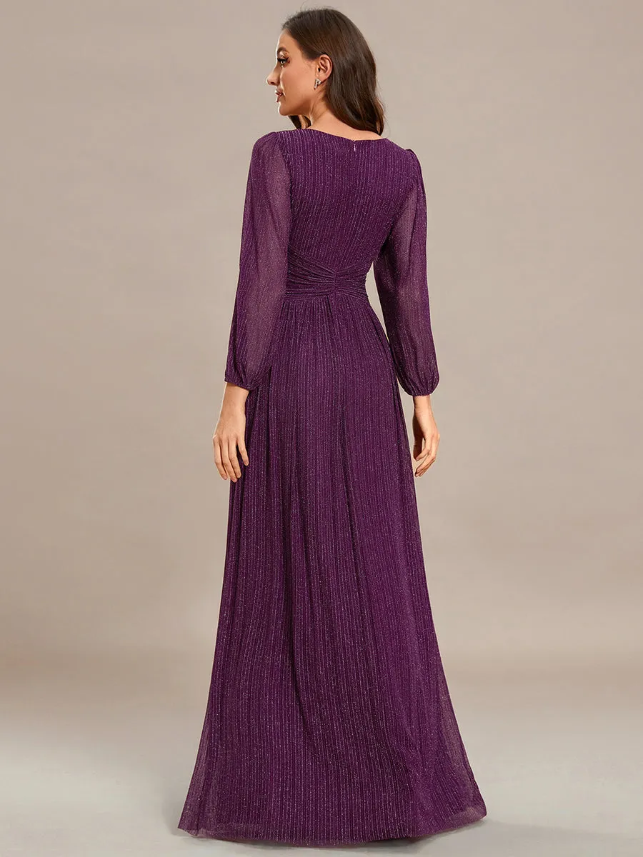 Robe de soirée trapèze à manches longues et taille empire scintillante