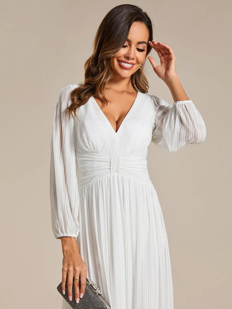 Robe de soirée trapèze à manches longues et taille empire scintillante