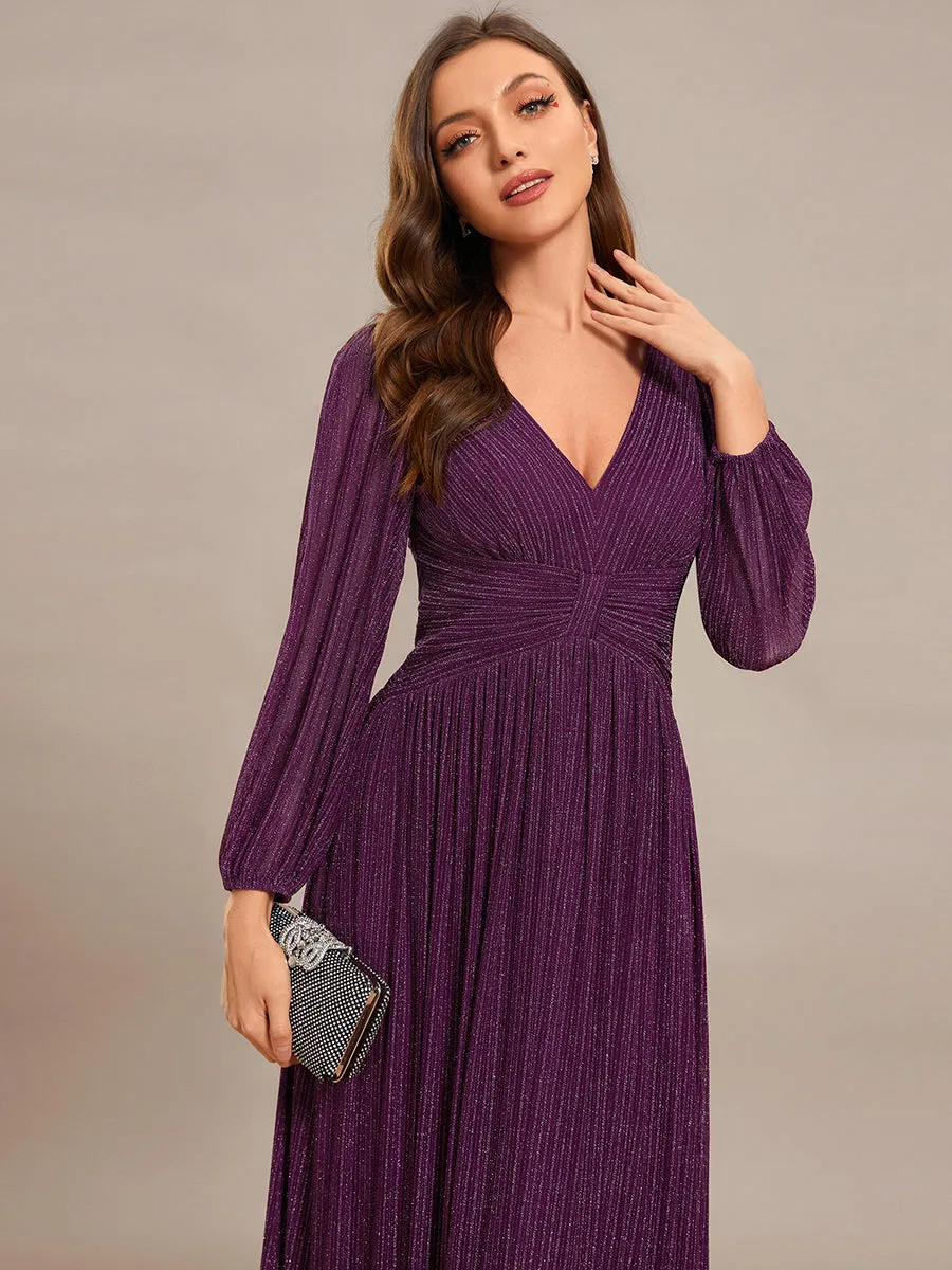 Robe de soirée trapèze à manches longues et taille empire scintillante