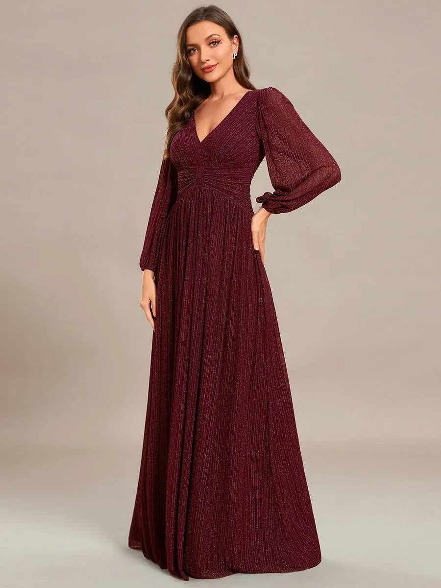Robe de soirée trapèze à manches longues et taille empire scintillante