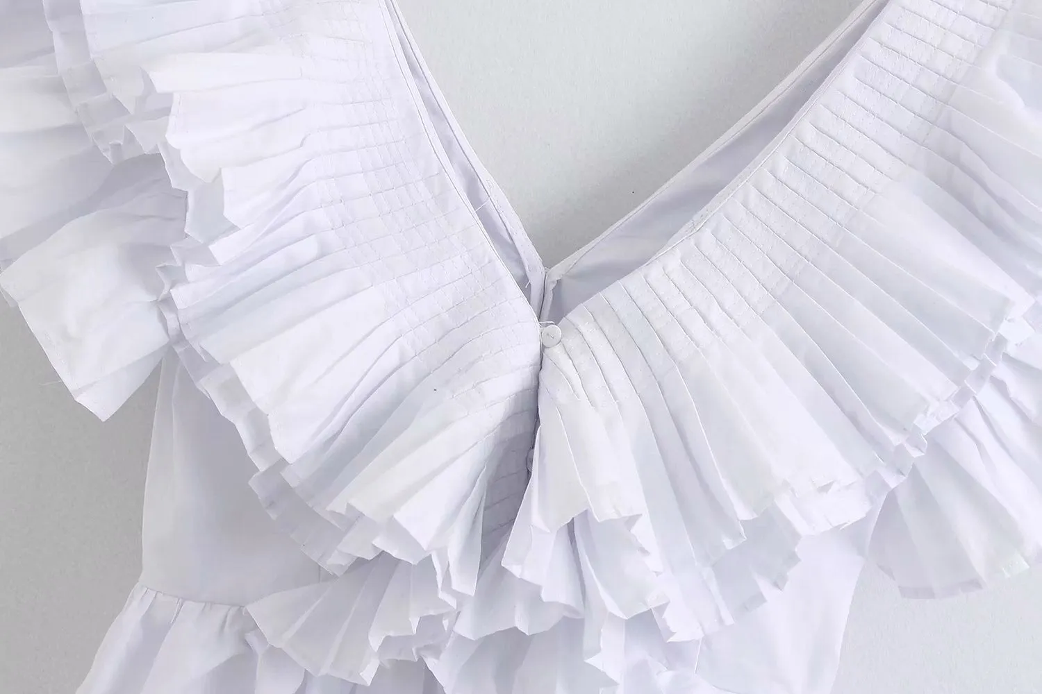 RUFFLED PLATTED BLOUSE
